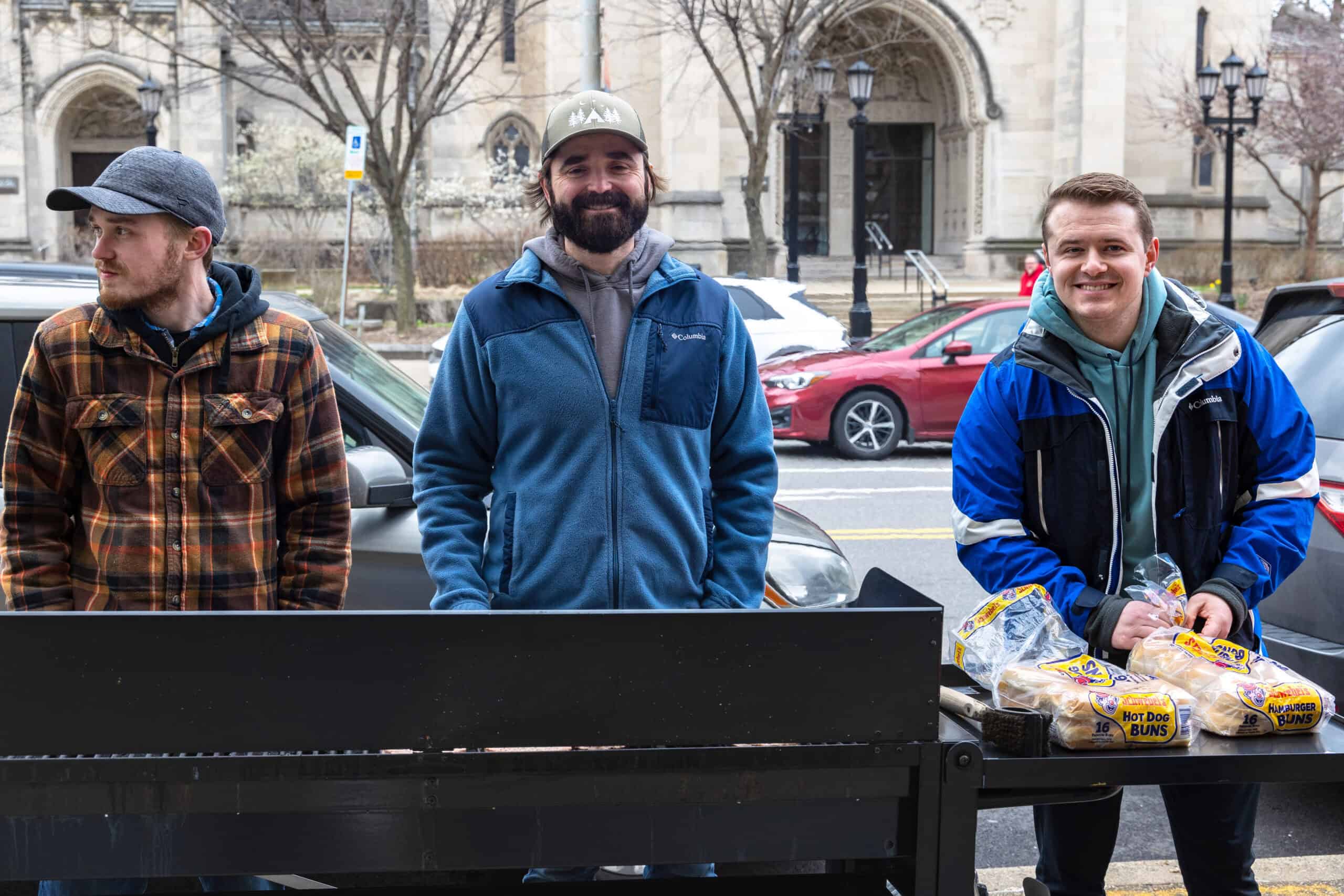 Volunteers serving as cooks for a cookout