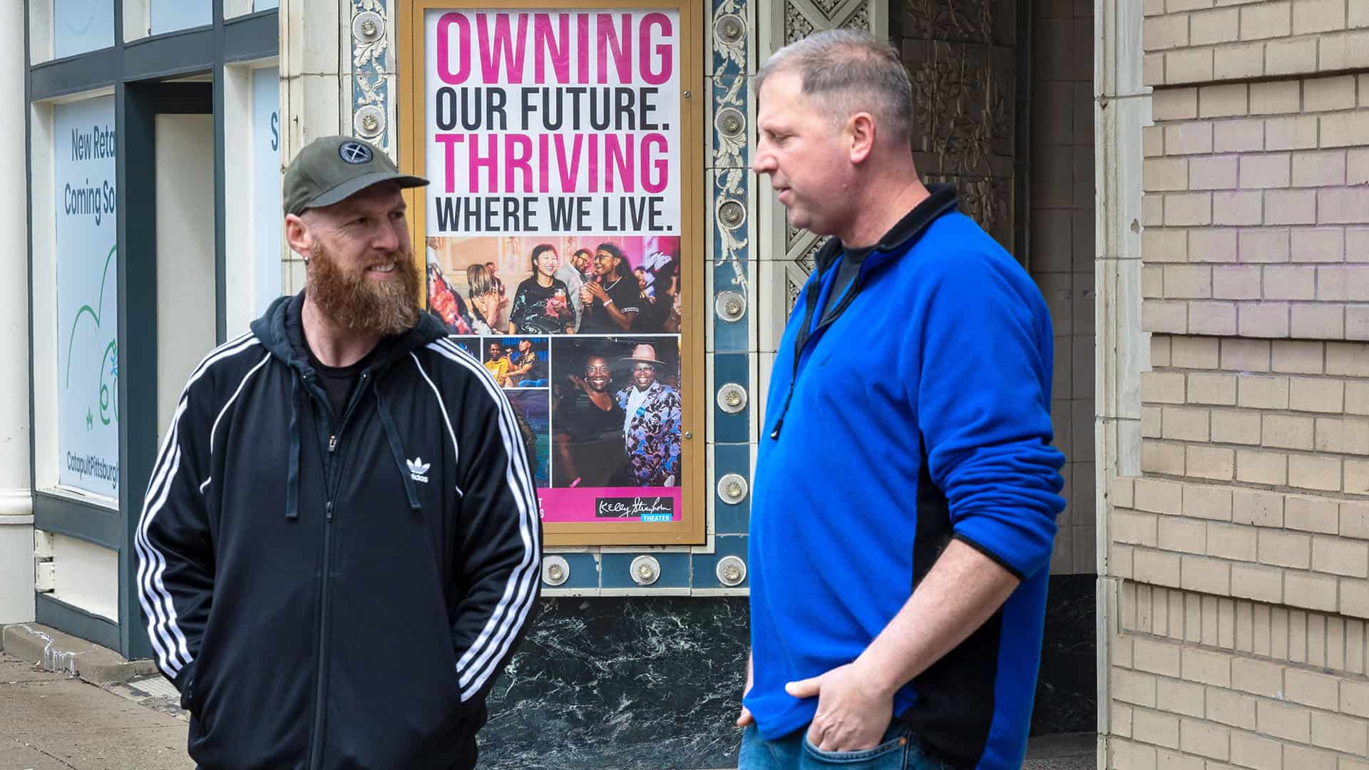 Pastor Bryan talking with an East End resident